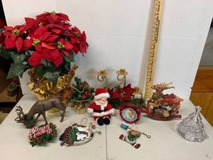 lot 659 image: Holiday Decor - Music box, Candle stand, Poinsettia, ornaments, Baby Santa