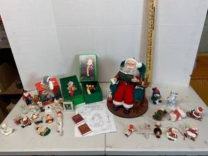 lot 660 image: Holiday Decor - Santa Read Me a Story Electric Figurine, Hallmark Stocking holders, Mini ornaments