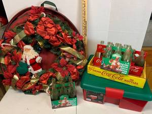 lot 663 image: Holiday Decor - Large Wreath in Storage Bag, Ornament Storage tub, Coco-Cola Christmas Collector Bottles & cartons