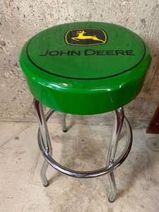 lot 690 image: Chrome leg bar Stool with John Deere Vinyl seat - 14x29