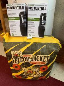 lot 697 image: Morrells Yellow Jacket Crossbow Field Point Target, 2 boxes of parts for Moultrie Pro Hunter II programmable quick-lock Feeder kits