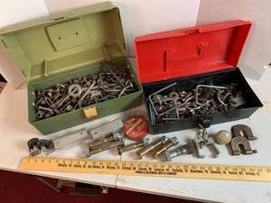 lot 712 image: 2 toolboxes with miscellaneous metal - parts, clamps, bolts, casters, etc.