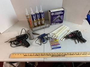 lot 715 image: Heat Gun, Hot Glue gun & glue sticks, Liquid Nails, Caulking gun, Powr Kraft Electric Soldering gun