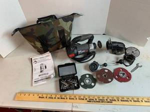 lot 716 image: RotoZip Rotary Cutter RZ10, with accessories & bag