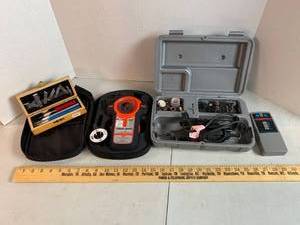 lot 718 image: Dremel Tool, Black & Decker Bullseye Laser level & Stud finder, Studsensor stud finder, X-Acto knife set in box