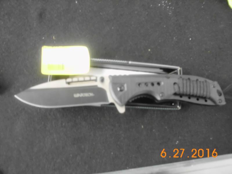 lot 1602 image: Wartech Spring Assist Knife With Para cord