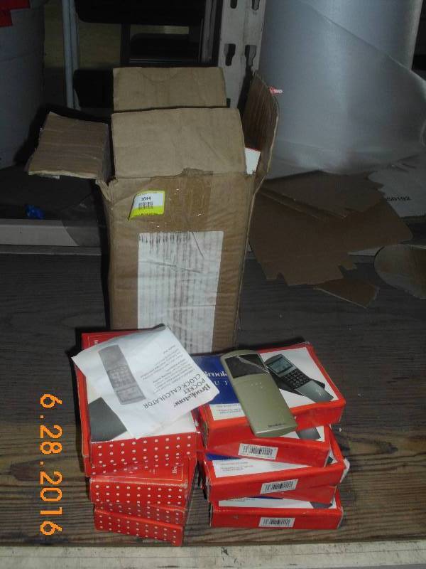 lot 1644 image: Lot of Brookstone Pocket Calculators 21 Total