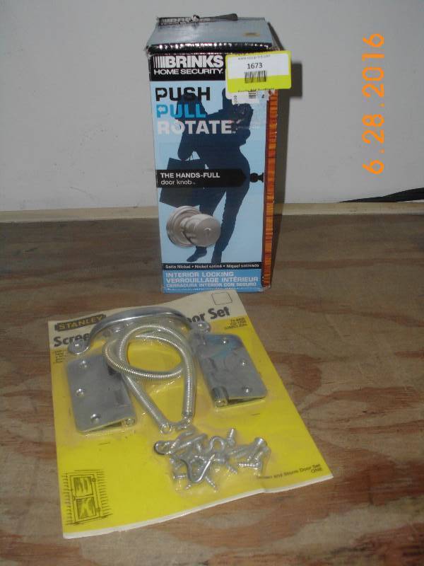 lot 1673 image: Brinks Hands Full Door Knob in Box Stanley Screen & Storm Door Set