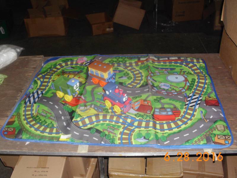 lot 1703 image: Child Play Mat Train Set