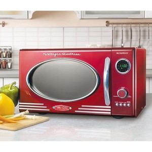 lot 1945 image: Nostalgia RMO4RR Retro 0.9 Cu. Ft. Microwave Oven, Retro Red Retail$159.99