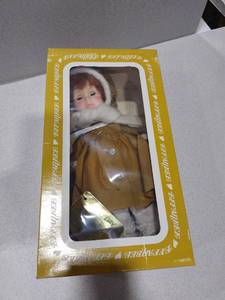 lot 1127 image: Effanbee porcelain doll on stand number 1404 with box