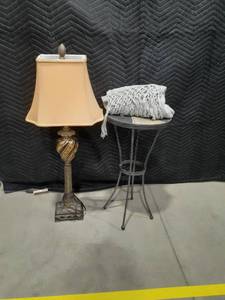 lot 2028 image: Table runner, plant table, approximately 25 x 13 and a table lamp, approximately 37 inches tall.