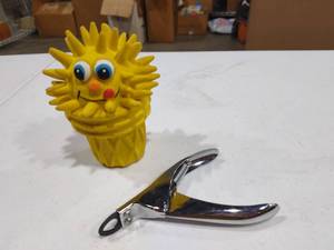 lot 4025 image: Squeaky chew toy with dog nail clippers