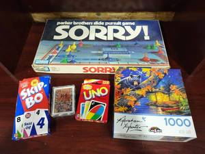 lot 4032 image: Sorry board game with Skip Bo and Uno and 1000 piece Abraham Hunter puzzle