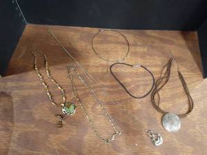lot 6013 image: 7 Necklaces. 1 has a pr. of earrings to match