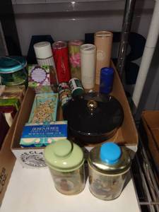 lot 3056 image: Avon perfumes and toiletries talc powders
