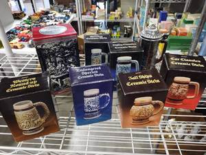 lot 3070 image: Avon ceramic decanter steins