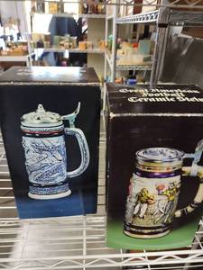 lot 3072 image: Avon stein decanters