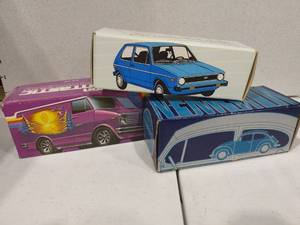lot 3135 image: Avon glass vehicle cologne decanters with box