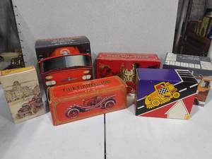 lot 3136 image: Avon glass vehicle cologne decanters with box