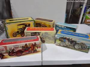 lot 3143 image: Avon glass vehicle cologne decanters with box
