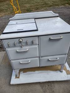 lot 848 image: 1930s Detroit Jewel gas stove will need cleaned 36 in wide 25 inches deep 40 in tall