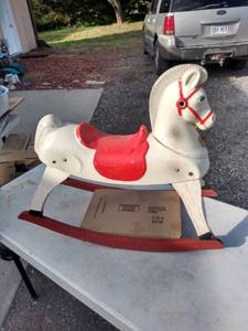 lot 876 image: happy the hairless rocking horse by trail rite made in 1950 and was painted red white and blue for Americas color will need bar replaced between rockers