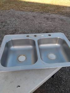 lot 887 image: used double stainless sink 33 in wide 22 inches long 6 in deep