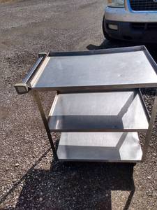 lot 895 image: 3 Shelf stainless cart on wheels 30 in long 18 in deep 302 in tall