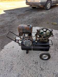 lot 897 image: vintage air compressor has 6 14 Kohler horsepower motor with cast iron linings when unloading broke 1 fitting it has Good compression