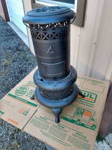 lot 903 image: antique perfection oil heater