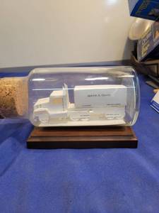 lot 3537 image: Newton a graves paper truck in a bottle