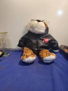 lot 3583 image: Tiger with leather vest that says love
