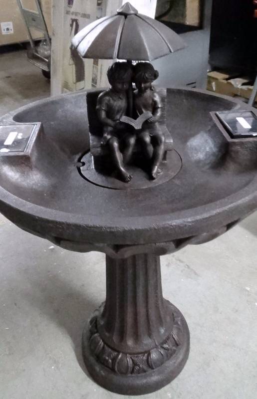 lot 4073 image: Smart Solar Umbrella Series Solar Fountain, Boy and Girl Reading on a Bench