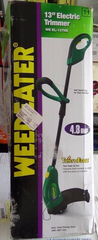 lot 3008 image: Weed Eater EL-13TNE 13-Inch 4.1 Amp Tap-N-Go Head Twist-N-Edge Shaft Electric String Trimmer