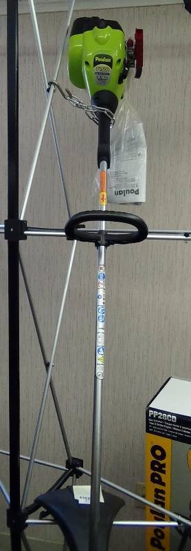 lot 4119 image: Poulan P1500 16-Inch 25cc 2-Cycle Gas-Powered Curved-Shaft String Trimme