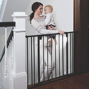lot 3509 image: Toddleroo by North States 38.25 Wide Light The Way BabyGate Heavy Duty Metal gate with Light Sensing LED for Added Safety. Pressure or Hardware Mount. Fits 28.75-38.25 Wide (29.3 Tall, Bronze)