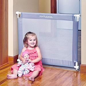 lot 3872 image: Toddleroo by North States 42.6 wide Portable Traveler Baby Gate Easy to install and folds up to fit in included travel bag. Pressure Mount. Fits 25.2 - 42.6 wide. (28 tall, Light Gray)