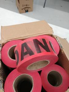 lot 47847 image: 12 Danger rolls of Ribbon