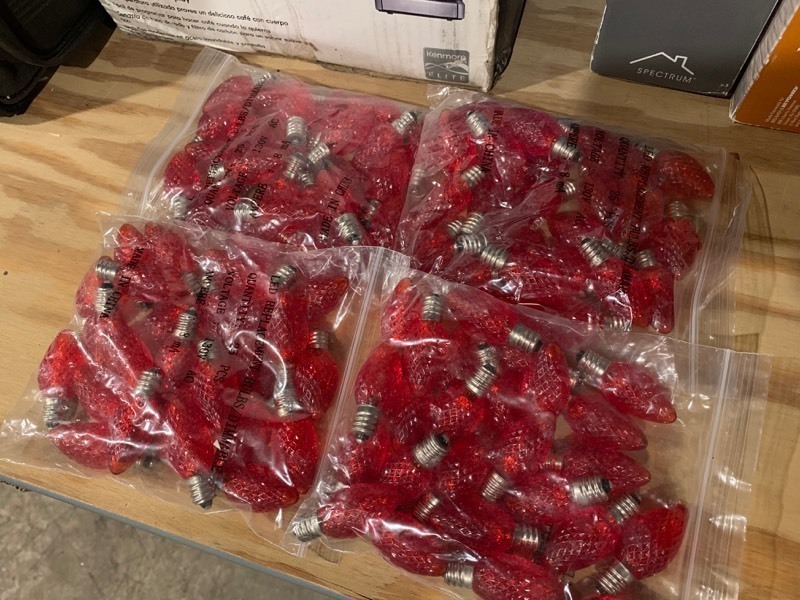 lot 273 image: Lot of 100 Faceted LED Red Christmas Dimmable Bulbs