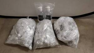 lot 1619 image: Lot of 3 Bags of 1oz Hand Sanitizer Bottles on Carabiners 50 count per bag or more, and 2 16.9 Pump Bottles of Sanitizer, Purina