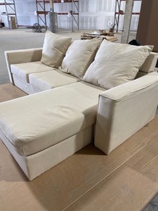 lot 54998 image: Cream colored small sectional