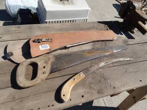 lot 1686 image: 2 tree saws w leather case