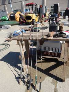 lot 1691 image: 5 assorted fishing poles & 3 fishing reels