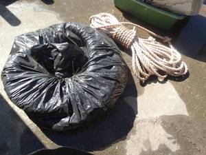 lot 1722 image: Swimming pool hose & roll of rope