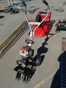 lot 1755 image: Stihl MM55C gas front tine rototiller
