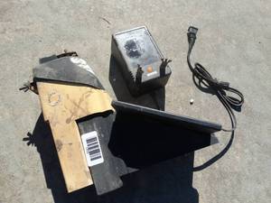 lot 1773 image: 2 electric fence chargers- 1 is solar