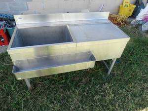 lot 1800 image: Commercial stainless steel ice well w drain board and speed rail