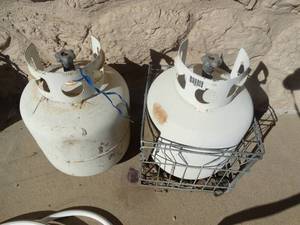 lot 1819 image: 2 propane tanks- 1 is partially full