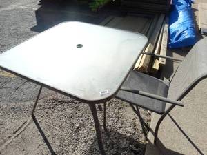 lot 1836 image: Glass top patio table w patio chair